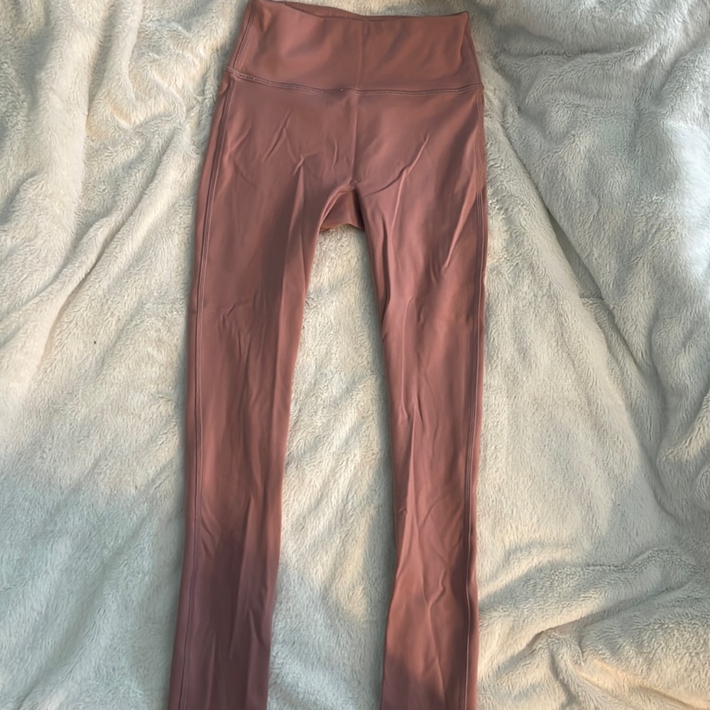 these are pink high waisted Fabletics leggings.